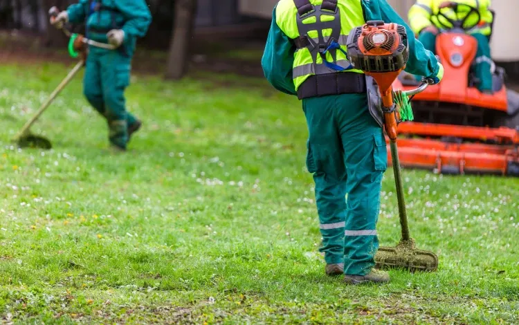 PPM technician performing landscape maintenance