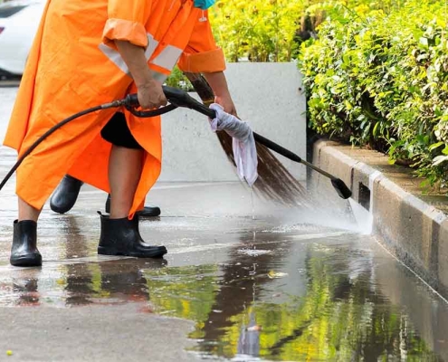 commercial parking space being pressure washed