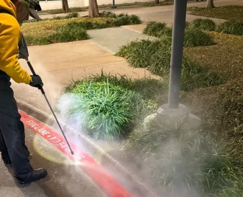 commercial space exterior being pressure washed