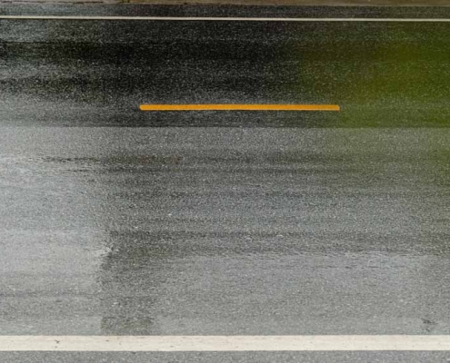 rain-pelted asphalt