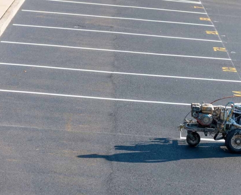 empty parking lot being re-striped