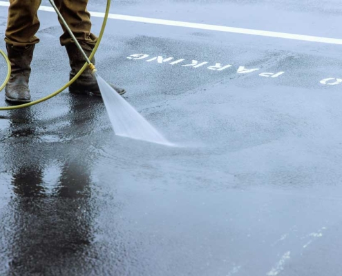 parking lot being pressure washed